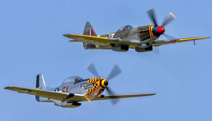 Fighter Jet flying overhead as viewers from the ground look up in awe